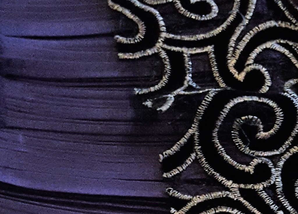 black and silver velvet lace for a jacket and a pleated piece of purple crepe de chine